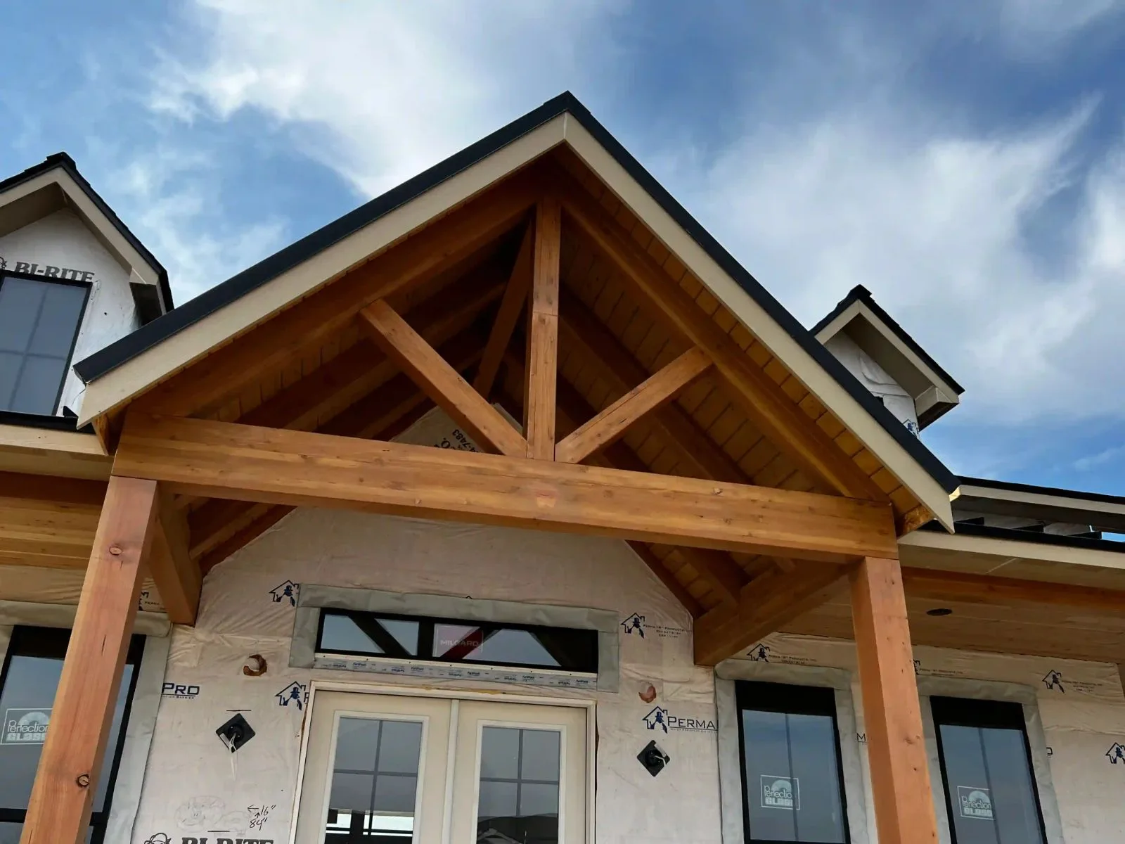 Timber-framed porch gable built by J&M Construction