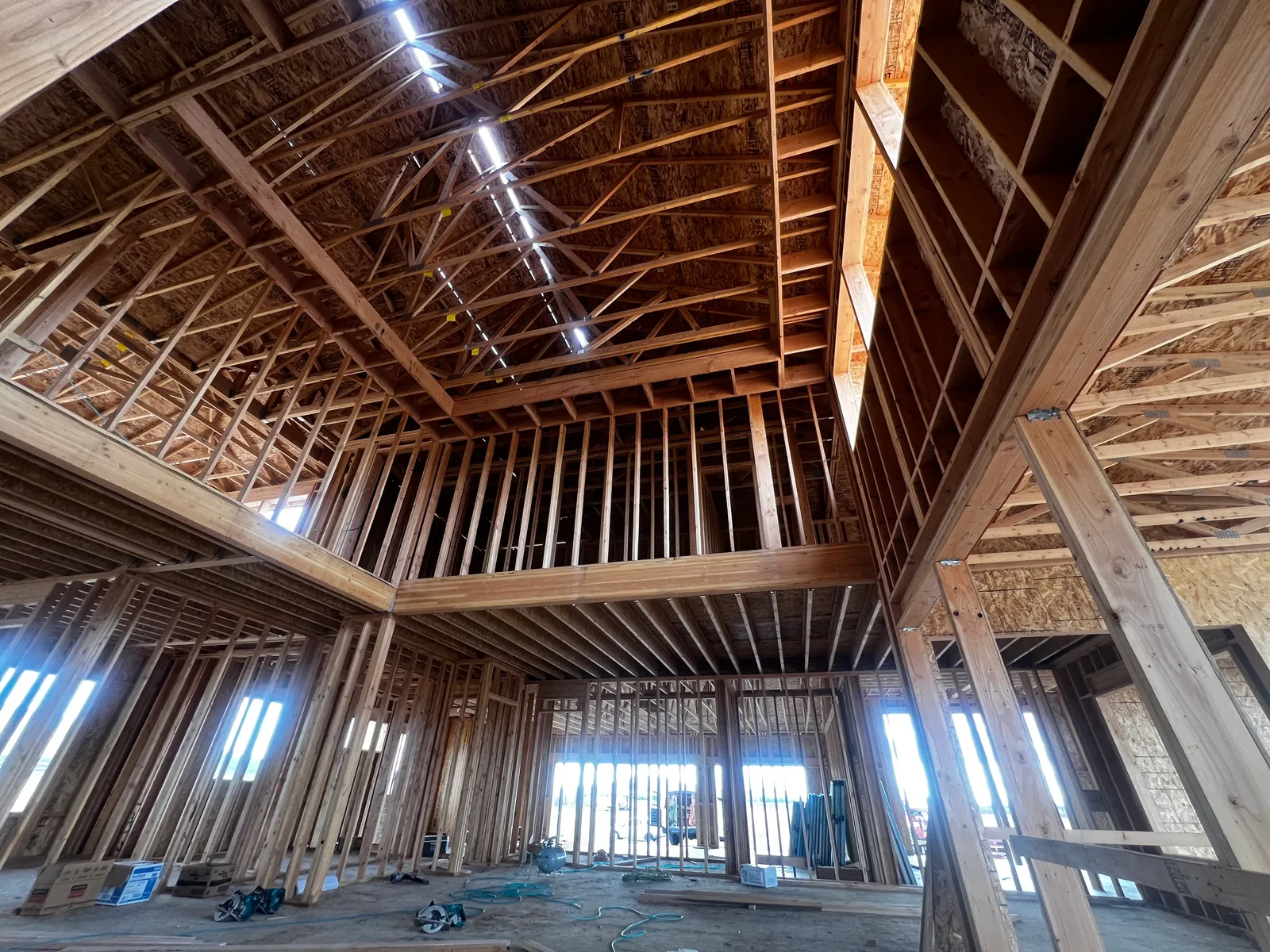 Vaulted great room interior framing with skylights